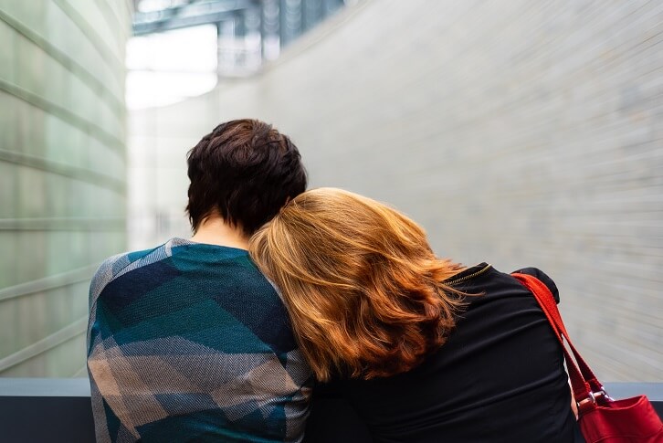 Lesbian couple cuddling