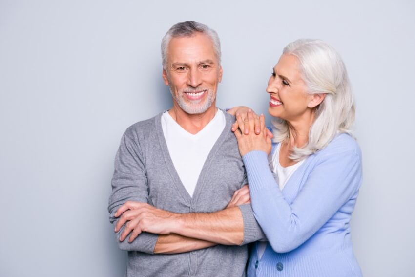 Smiling mature couple with silver hair