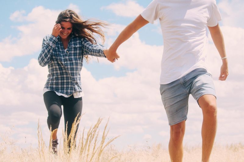 Christian couple holding hands