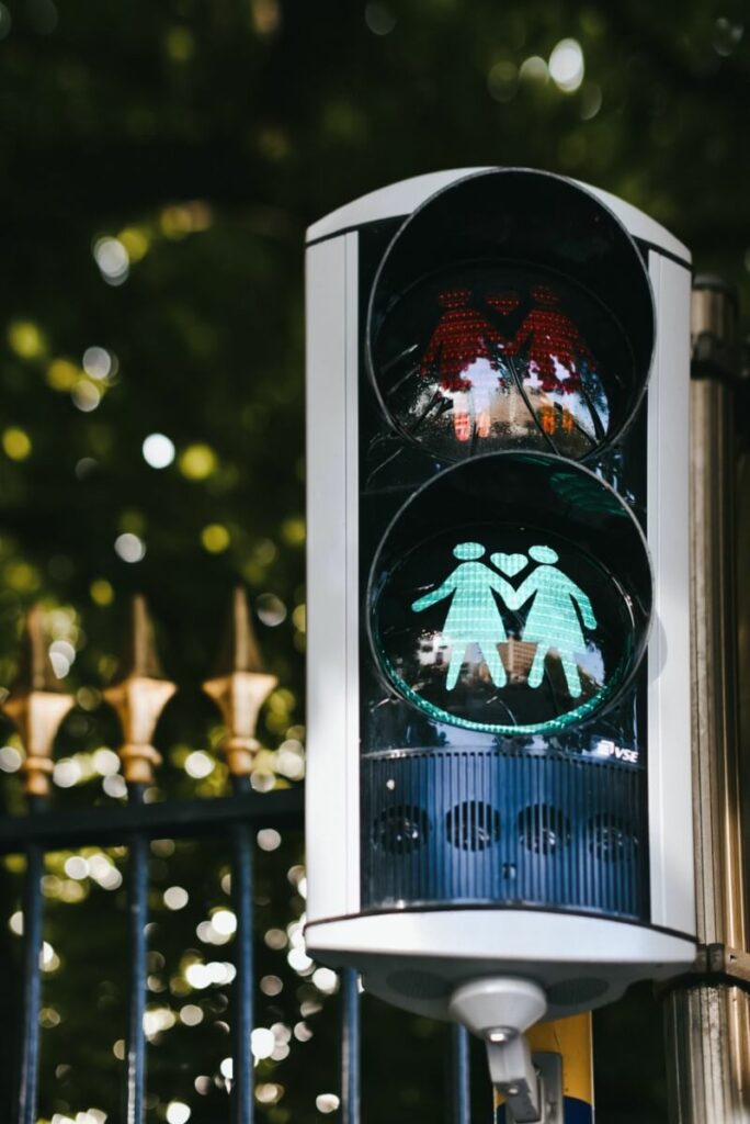 Traffic light with symbol of two women holding hands