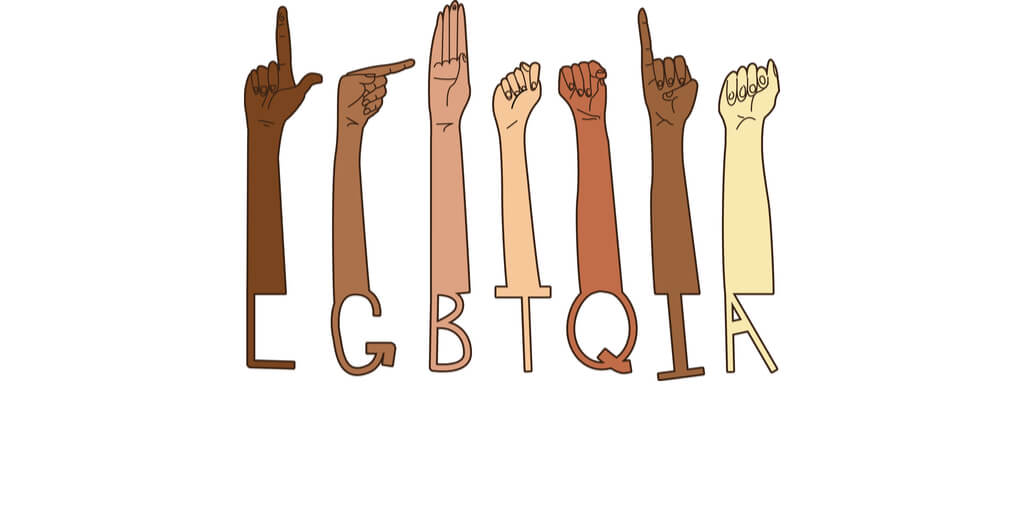 Hands showing lgbtqia letters