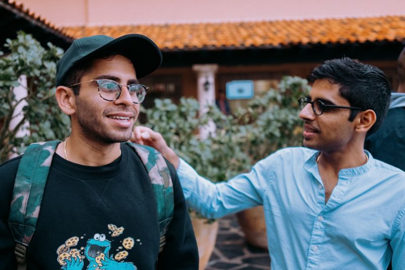 Two male friends with glasses