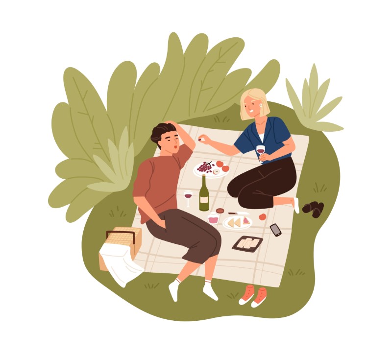 Vector art of two people having a picnic as their first date