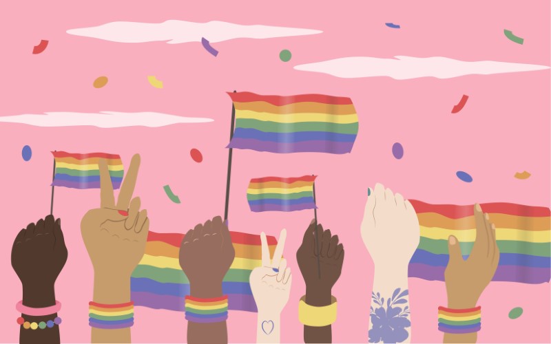Vector art of several hands holding up pride flags in the air and confetti flying around